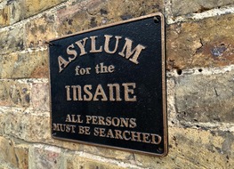 black asylum for insane plaque